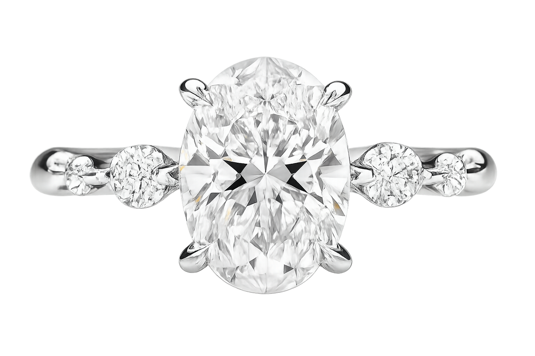 Oval diamond ring set with smaller round diamonds | ChatGPT Image Jun 18, 2025, 12_20_41 PM.png