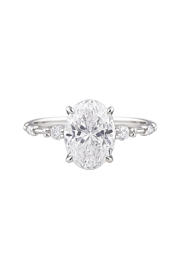 Oval diamond ring set with smaller round diamonds | Hero.png