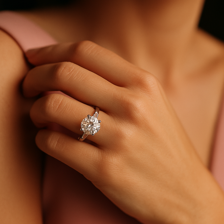 Round diamond set with tapered baguettes on the band | undefined